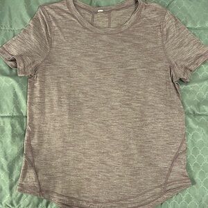 Purple Lululemon running shirt sleeve tee. Size 8.